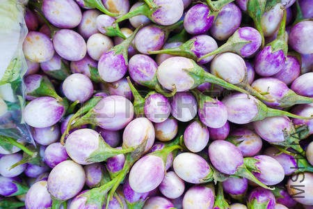 38180888-purple-eggplant-solanum-melongena-at-market.jpg